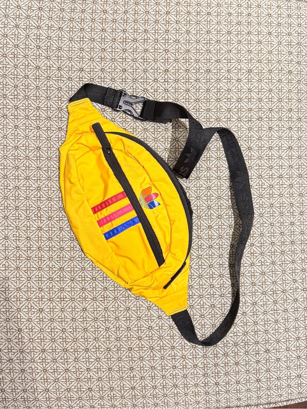 Yellow Adidas Waist Bag with Multicolor Stripe Accent